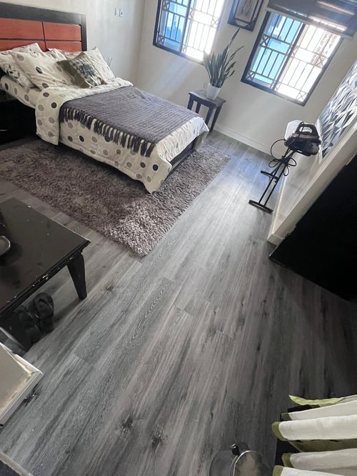 Grey flooring bedroom